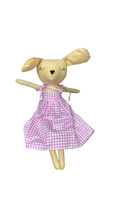 Stuffed animal toy with a pink checkered dress