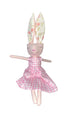 Toy figure with bunny ears and a pink dress