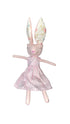 Stuffed toy with bunny ears and a dress
