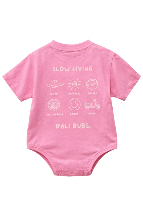 Pink baby onesie with text on a white background