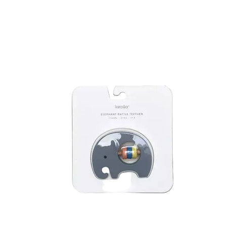 Keola Elephant Rattle Teether in a gray elephant shape with a colorful striped inner rattle, presented on its white backing card against a solid gray background.