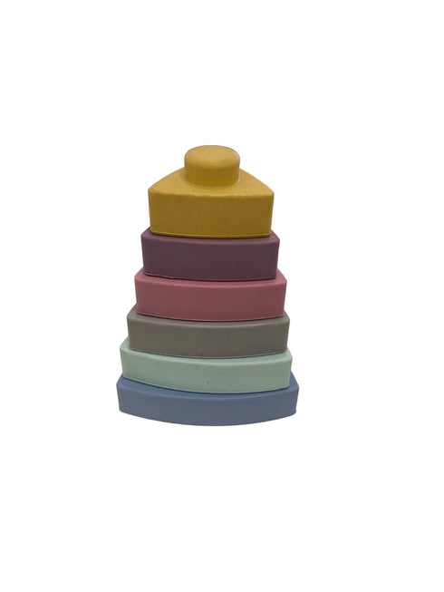 Stack of colorful geometric shapes on a desk