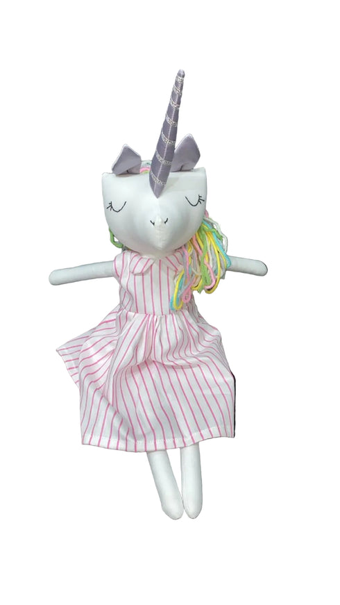 Stuffed toy with a striped dress and unicorn horn on a chair
