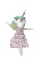 Stuffed toy with unicorn horn and floral dress on a chair