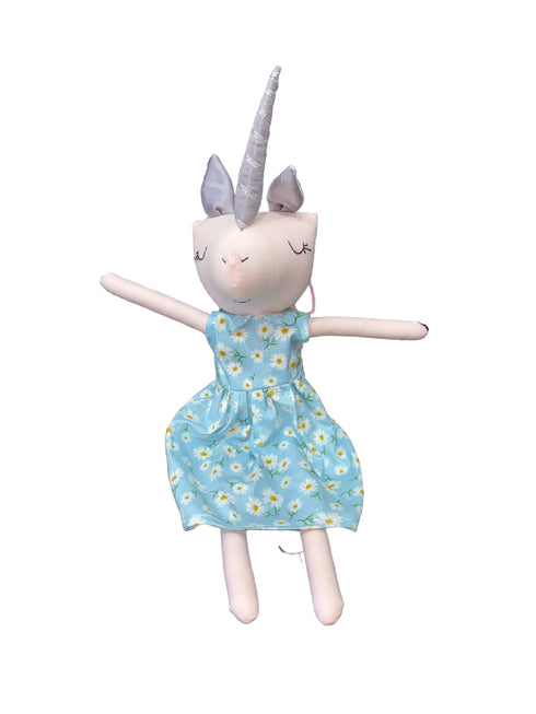 Stuffed unicorn doll with a blue dress featuring white flowers