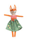 Stuffed fox toy with a red checkered shirt and green skirt on a white background