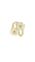 Pair of yellow hoop earrings with white floral accents on a white background