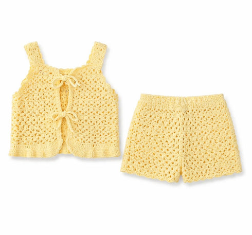 Yellow crochet tank top and shorts set on a white background