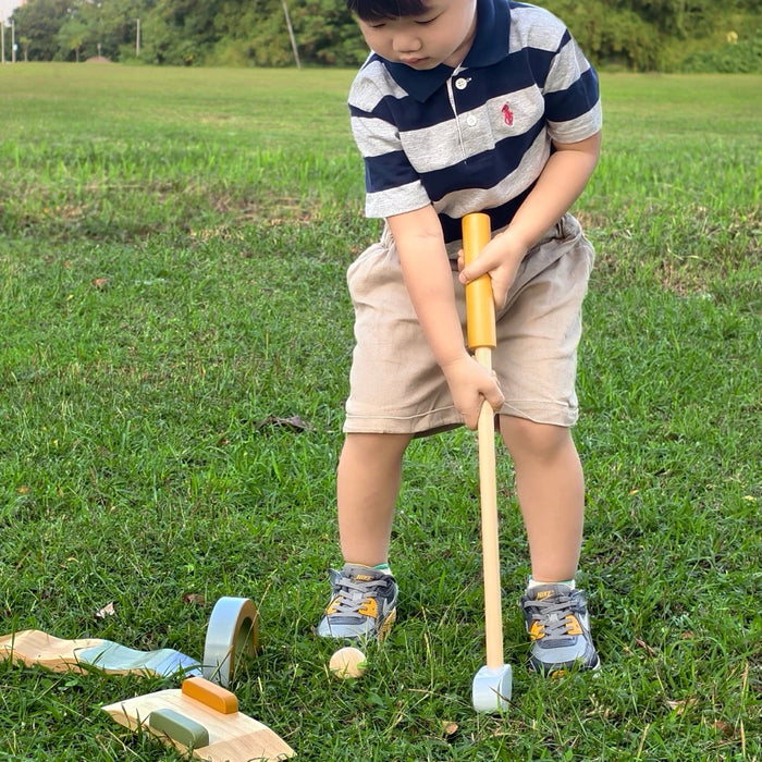 Play and Replay wooden mini golf set for kids with clubs, balls and obstacles